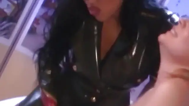 PussyCatsLatex com - Big ass lesbian′s paddling submission to leather-clad mistress