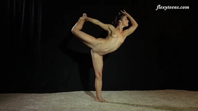  Busty acrobat Eva Rakova shows off her fit body