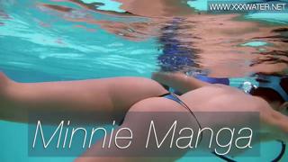Poolside porn star Minnie Manga enjoys a blue-tipped toy
