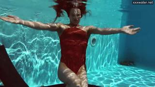 She's a sloppy, wet, poolside floozy, bent over a floating sex toy